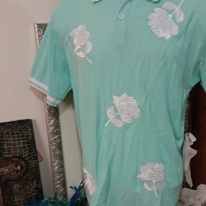 Elegant Mint Polo with White Floral Design
